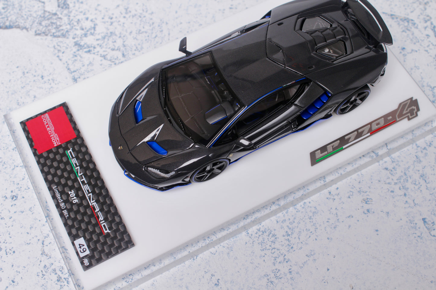 Lamborghini Centenario LP770-4 2016 Rear Wing up in Visible Carbon with Blue Accents — 01