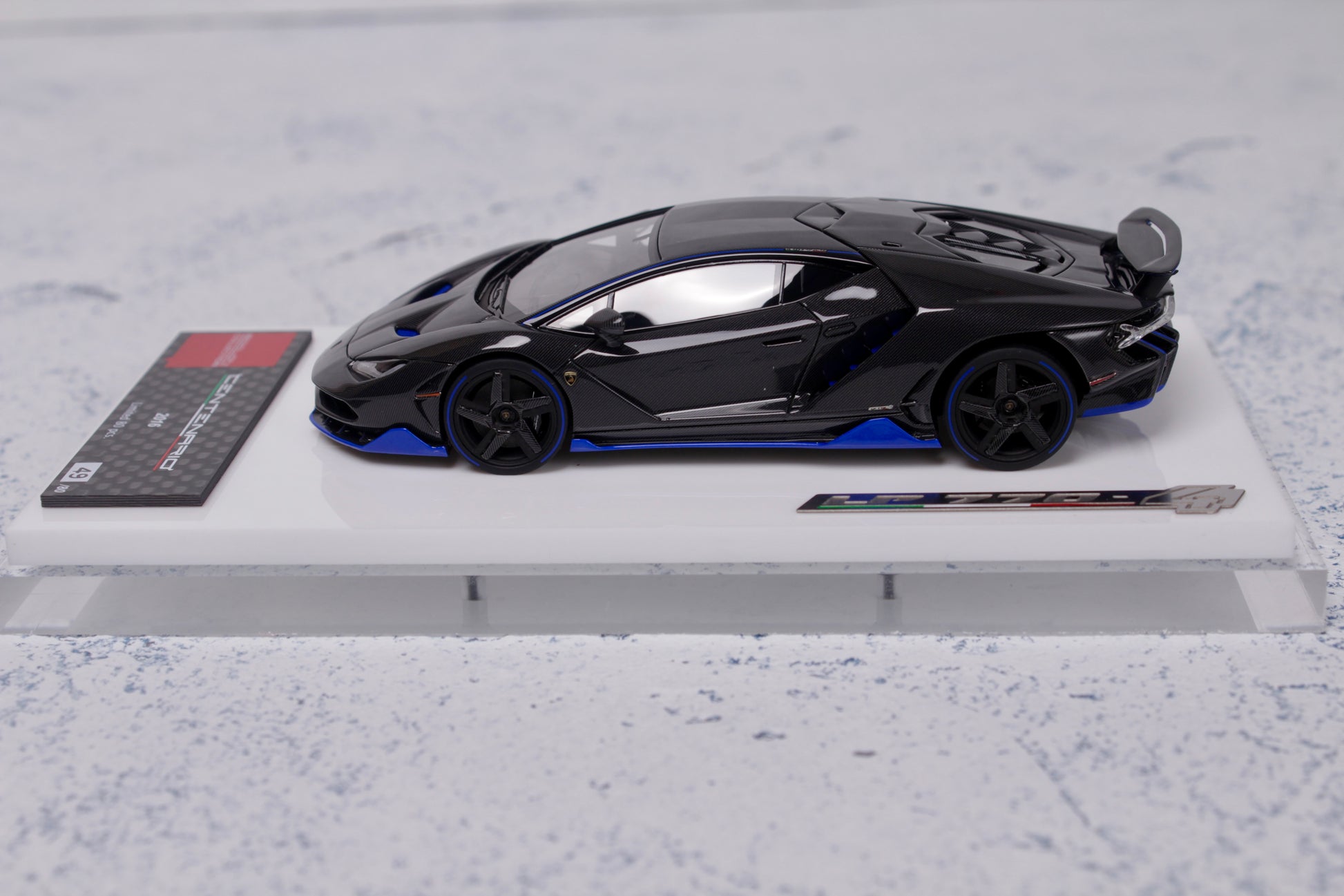 Lamborghini Centenario LP770-4 2016 Rear Wing up in Visible Carbon with Blue Accents — 02
